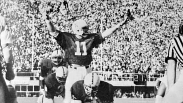 Jeff Quinn asks for quiet before Nebraska’s final play.
